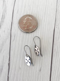 Crossed Arrows Oval Stainless Steel Earrings
