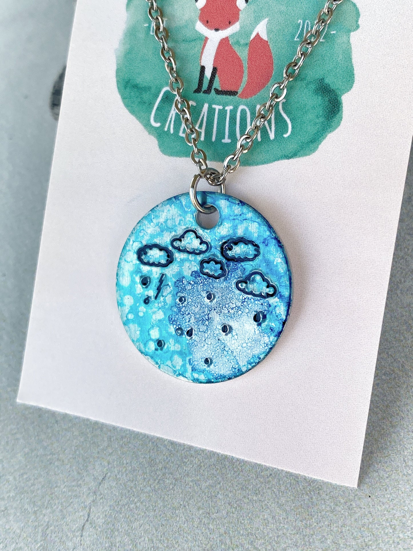Ellie B's Creations - Round Blue Aluminum Rainstorm Pendant - Storm Necklace - Hand Stamped Cloud Necklace - Rainstorm Necklace